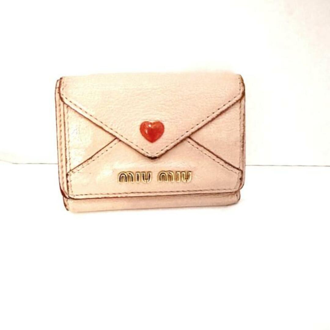 miumiu heart wallet.