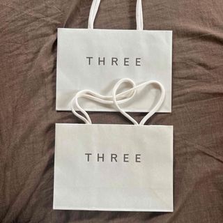 スリー(THREE)のTHREE  ショップバック　紙袋(ショップ袋)