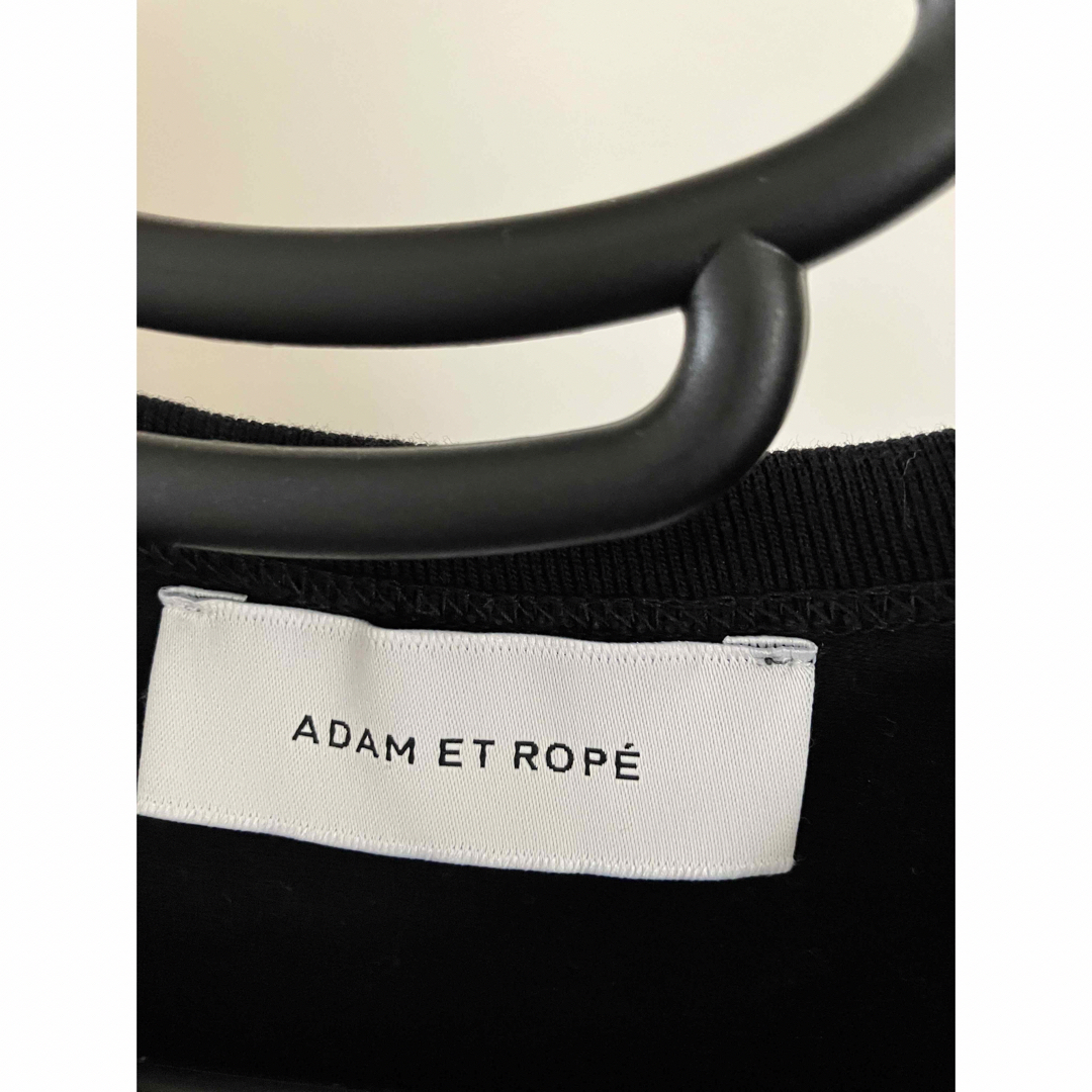 Adam et Rope'(アダムエロぺ)の美品 アダムエロペ　フリルトップス　黒 レディースのトップス(Tシャツ(半袖/袖なし))の商品写真