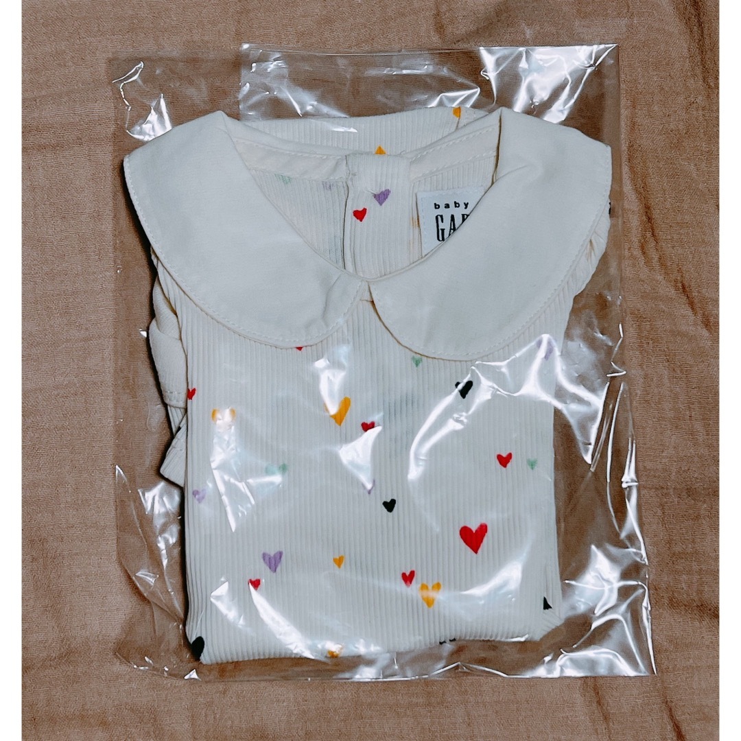 babyGAP(ベビーギャップ)の[新品]babyGAP 長袖ロンパース 50cm キッズ/ベビー/マタニティのベビー服(~85cm)(ロンパース)の商品写真