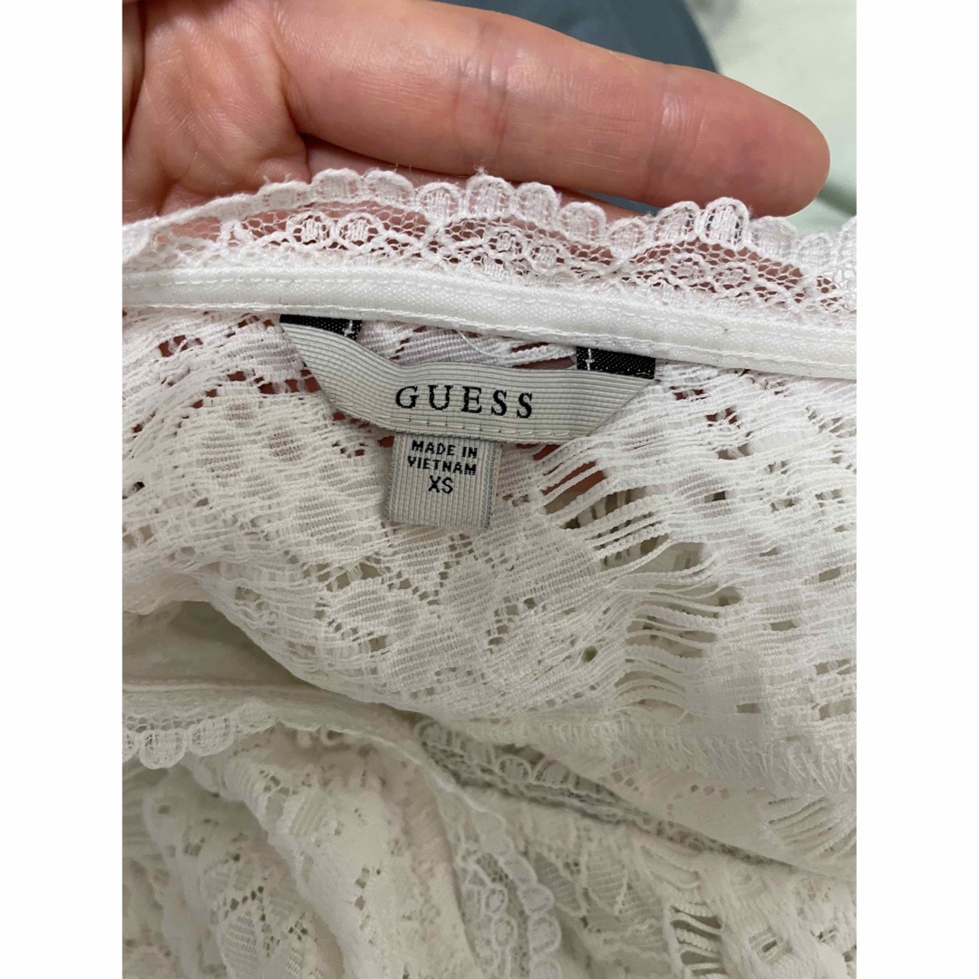 GUESS(ゲス)のGuess 白トップス メンズのトップス(Tシャツ/カットソー(七分/長袖))の商品写真