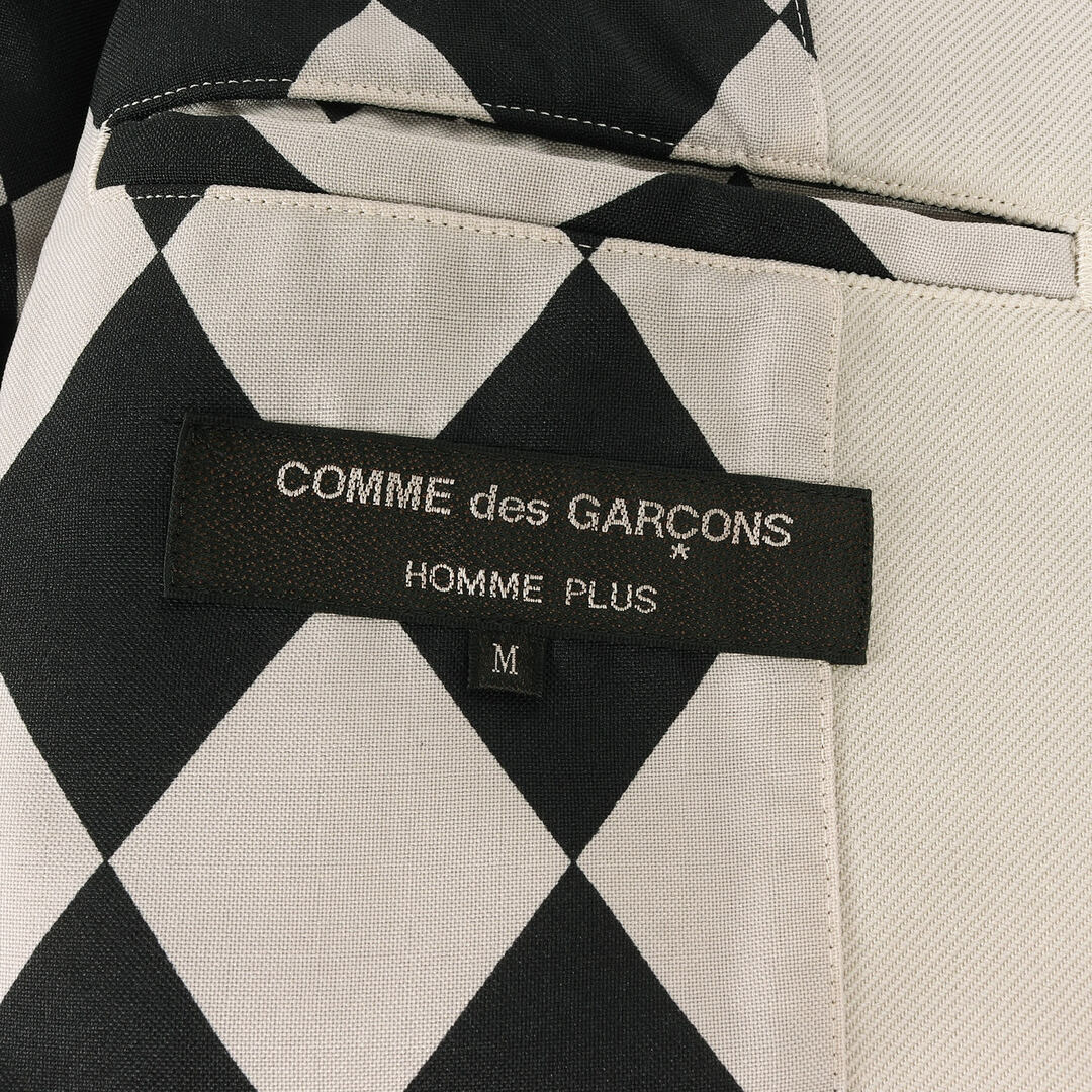 COMME des GARCONS(コムデギャルソン)のCOMME des GARCONS コムデギャルソン ジャケット サイズ:M 23SS ハーレクインチェック スリーブ ヘム スカート レイヤード ポリエステル 縮絨 2B テーラードジャケット PK-J038 ポリ縮 変型 再構築 HOMME PLUS ライトグレー ブラック 日本製 【メンズ】 メンズのジャケット/アウター(テーラードジャケット)の商品写真