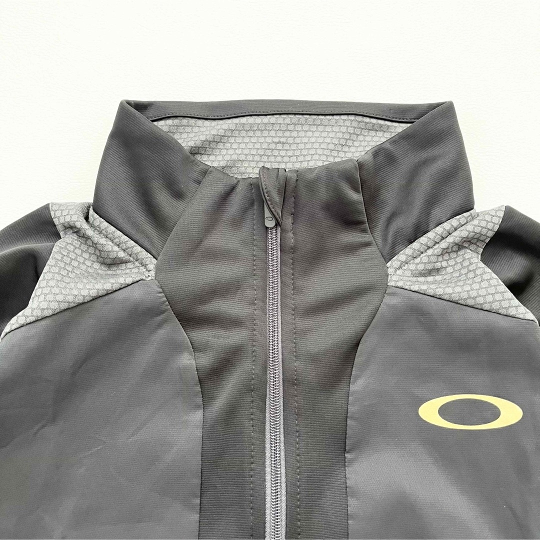 Oakley - OAKLEY✨オークリー トラックジャケット 黒 ゴールド ロゴ