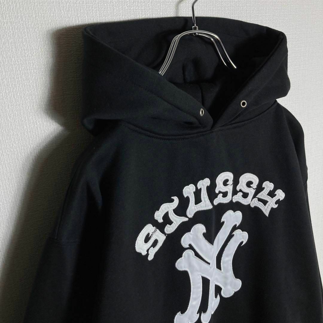 【USA製】STUSSY でかろご　　パーカー　黒　レトロ　アーチロゴ　L