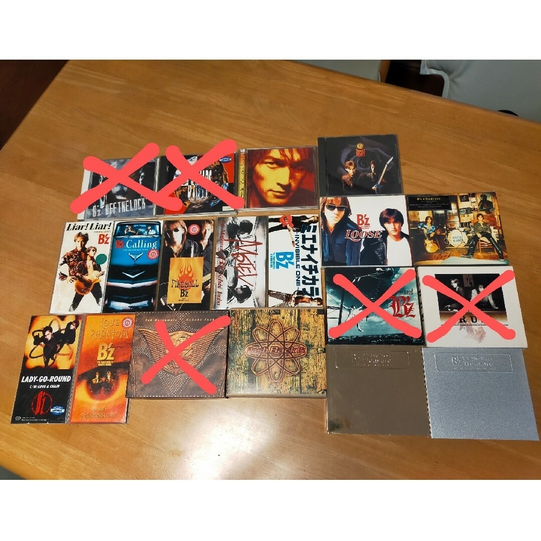 B'z CD まとめ売り アルバム7枚 シングル7枚 | フリマアプリ ラクマ