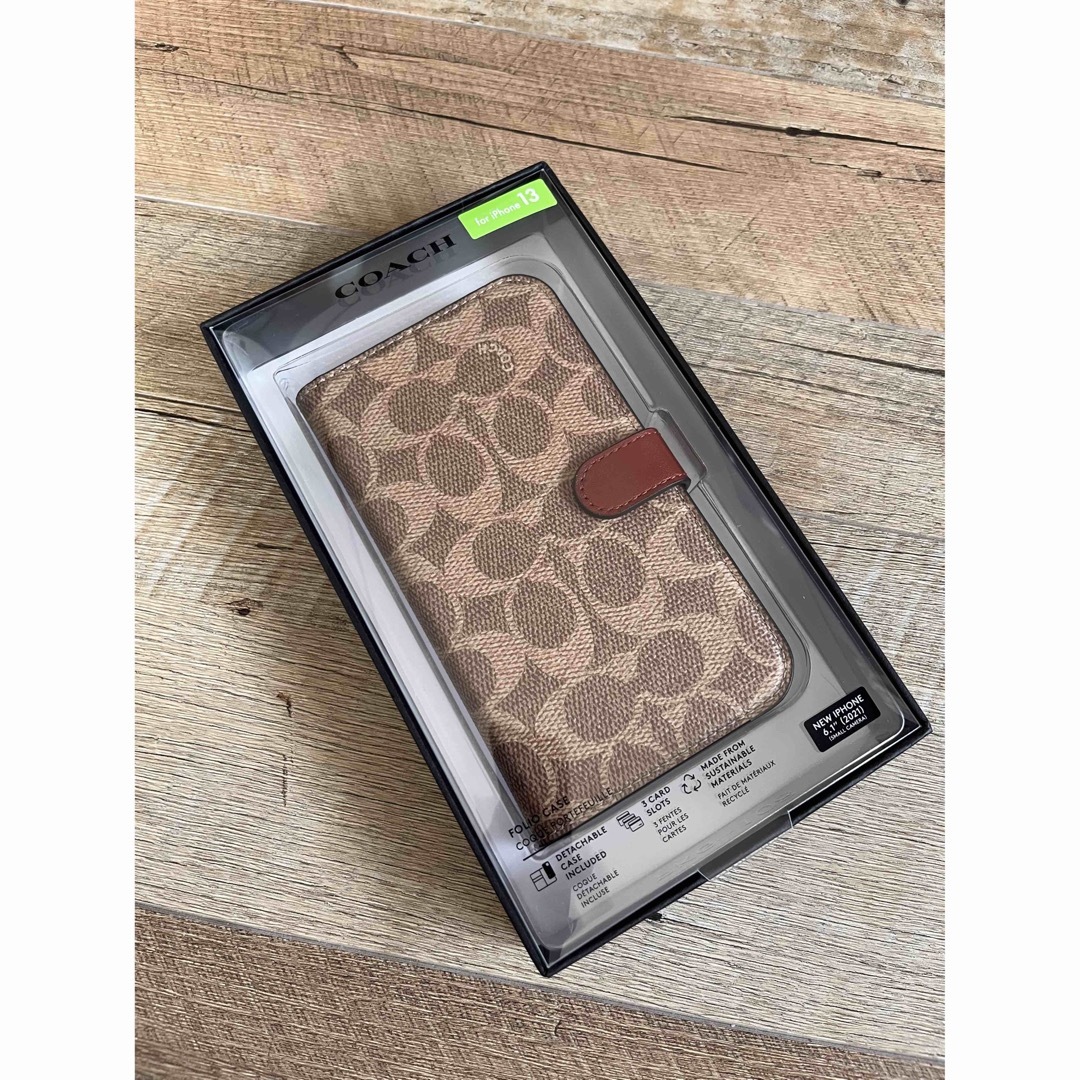 新品 COACH iPhone13 手帳型カバー シグネチャー コーチ-