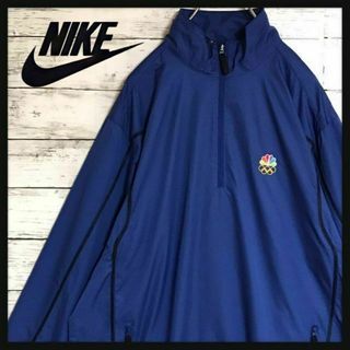 ナイキ(NIKE)の【美品】ナイキ⭐︎五輪ロゴ入りハーフジップナイロンジャージ　ネイビー　F159(ナイロンジャケット)