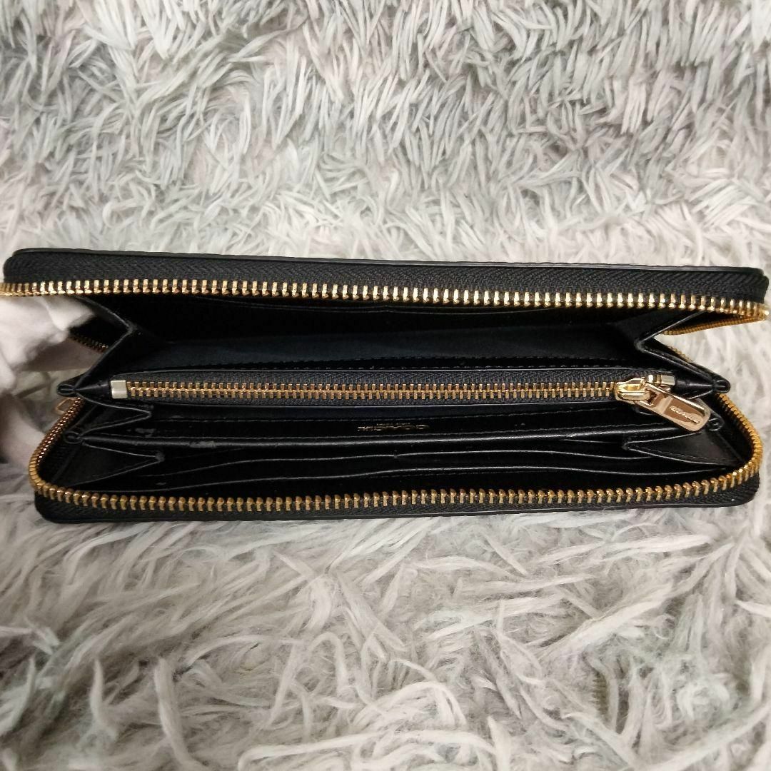 パイソンCOACHコーチラウンドファスナー長財布新品未使用カッコよく人気です。