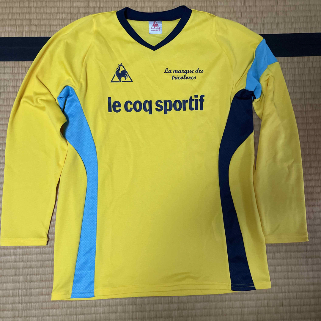 le coq sportif(ルコックスポルティフ)のプラクティスシャツ スポーツ/アウトドアのサッカー/フットサル(ウェア)の商品写真