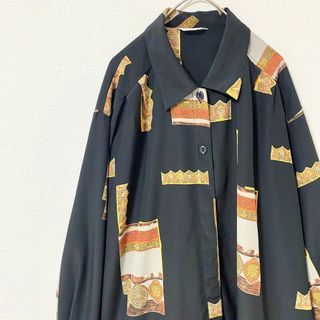 ナチュラルヴィンテージ(natuRAL vintage)のシャツ 長袖 アート 総柄 太アーム L相当 ブラック 黒 ヴィンテージ 古着(シャツ)