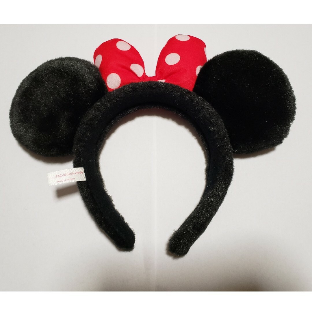 Disney(ディズニー)のディズニーランド　カチューシャ　ミニーマウス エンタメ/ホビーのおもちゃ/ぬいぐるみ(キャラクターグッズ)の商品写真