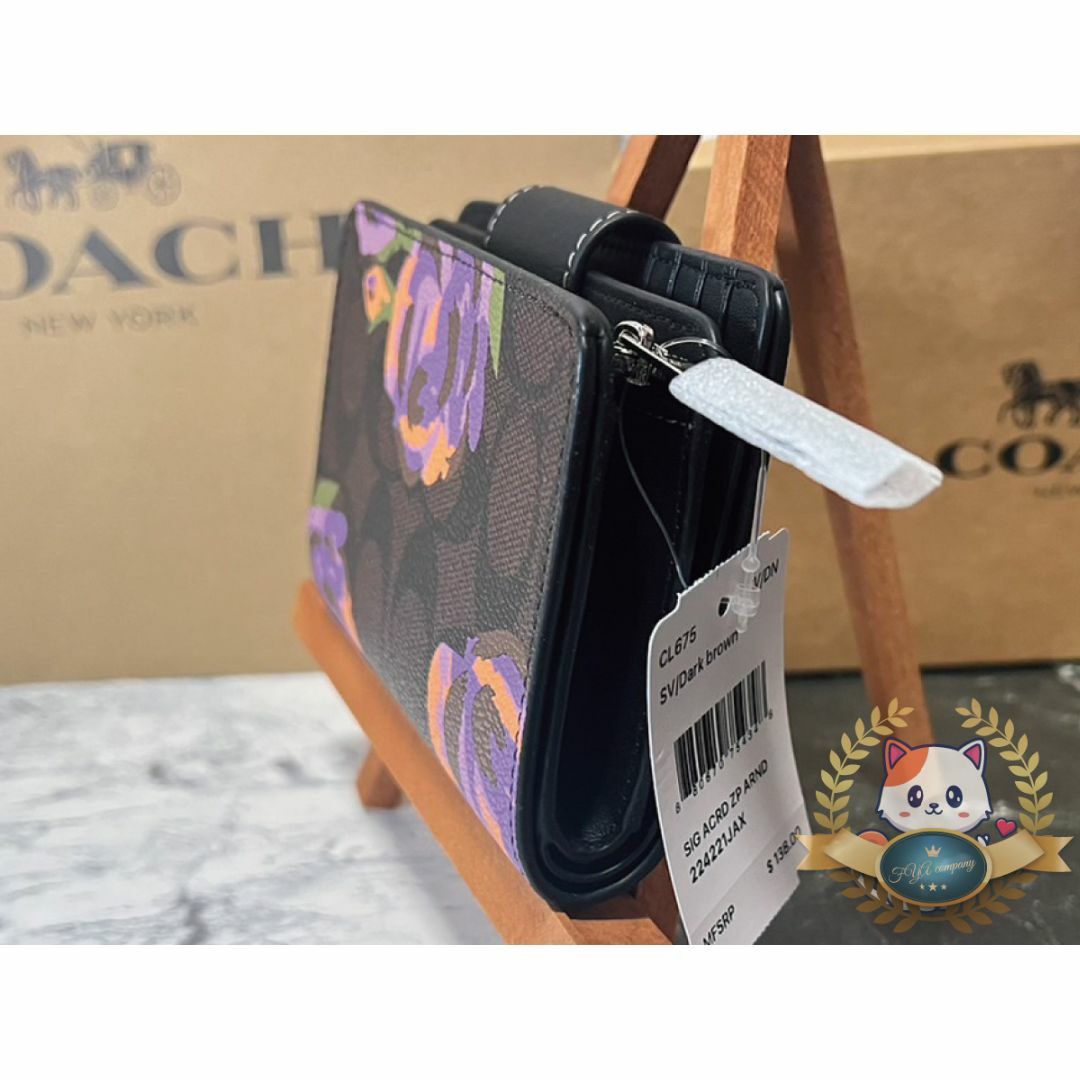 COACH(コーチ)のCOACH コーチ 二つ折り財布 フラワー　ブラウンシグネチャー　おまけ付き レディースのファッション小物(財布)の商品写真