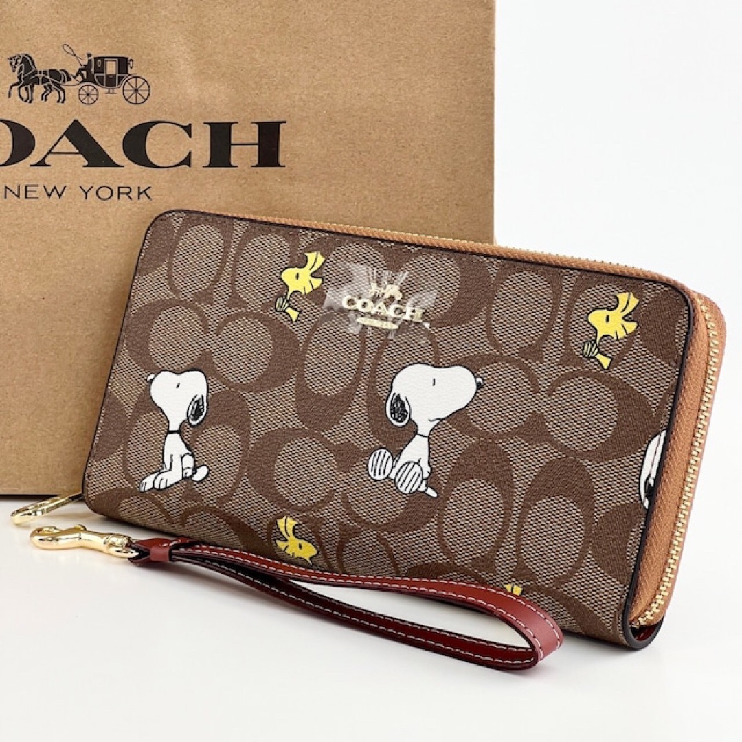 新品 Coach Peanuts 長財布 スヌーピー ウッドストック レディース