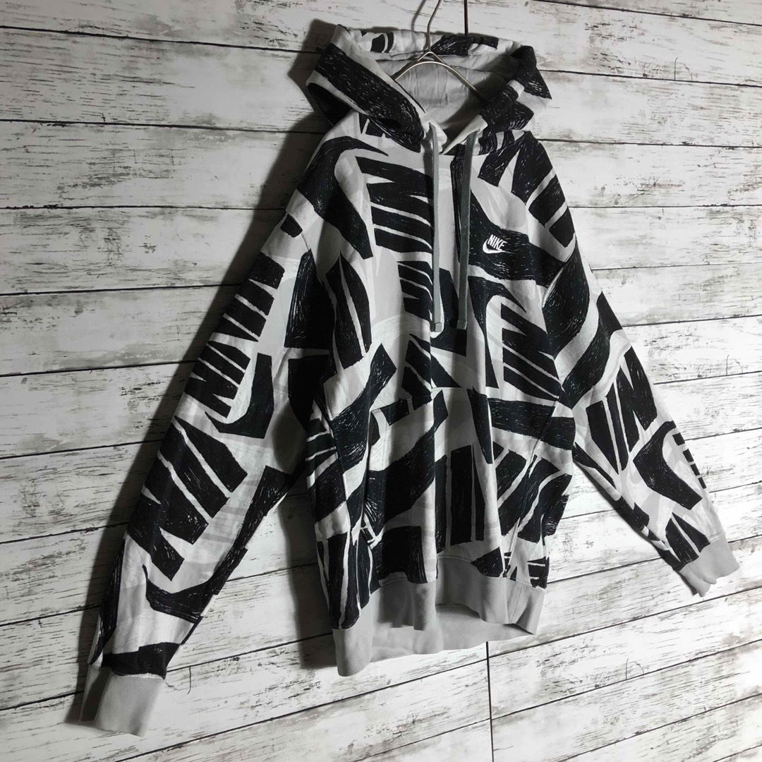 NIKE - 【人気デザイン】ナイキ総柄パーカー☆ワンポイント刺繍ロゴの