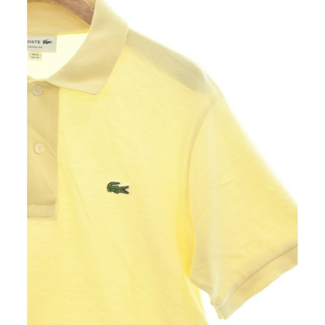 LACOSTE(ラコステ)のLACOSTE ラコステ ポロシャツ XS 黄 【古着】【中古】 レディースのトップス(ポロシャツ)の商品写真