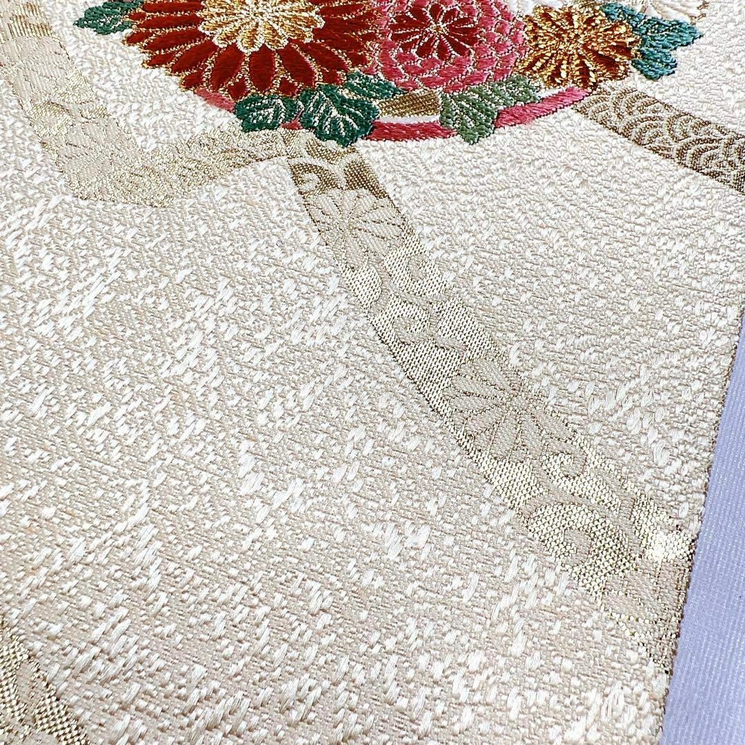 花紋や蝶紋が織られた袋帯　着物