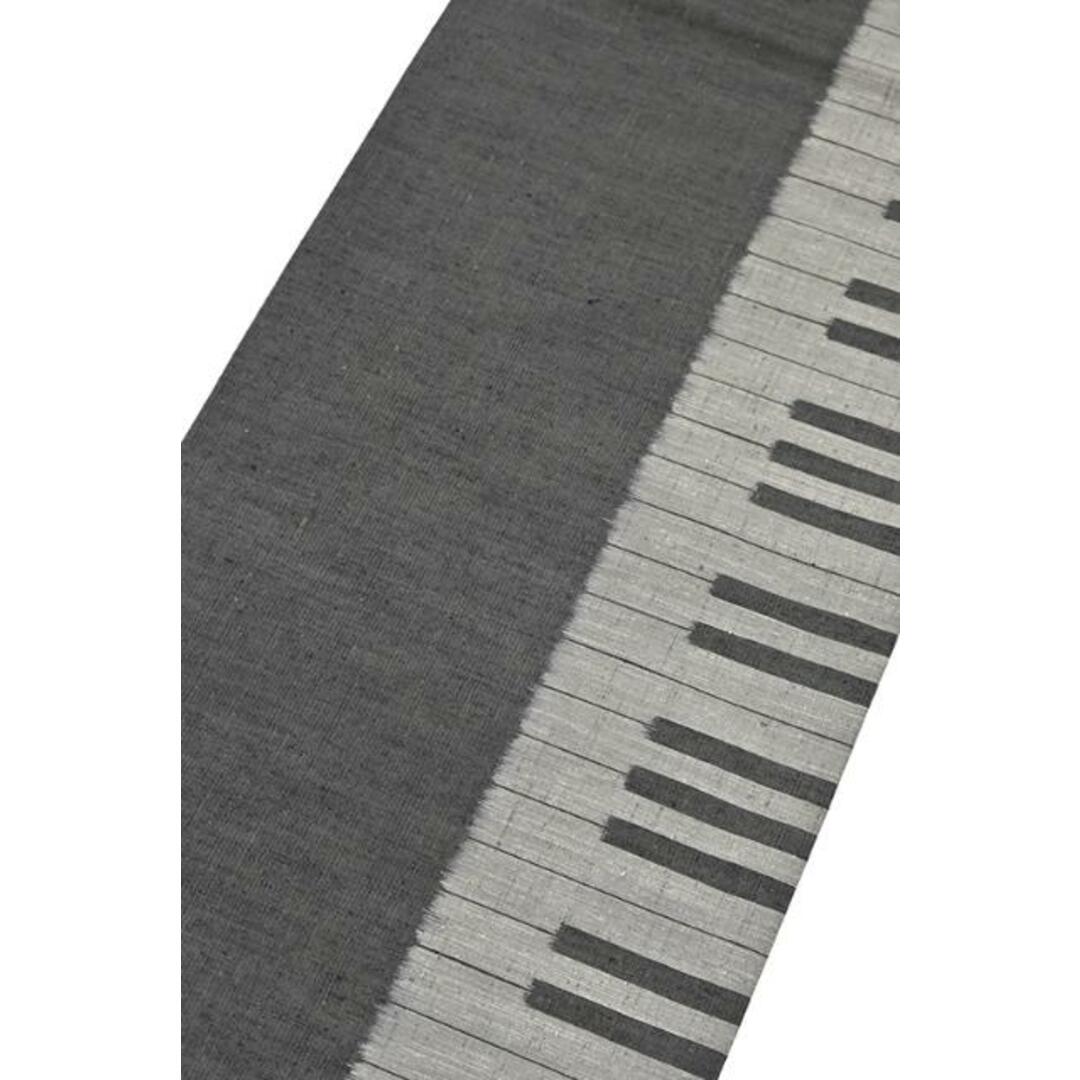 着物だいやす 111■名古屋帯■紬　緯絣　ピアノ　鍵盤　音楽　鉛色【正絹】【仕立て上がり帯】