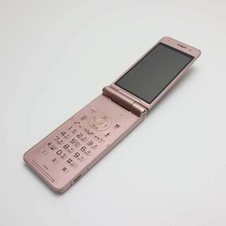 パナソニック(Panasonic)の良品中古 P-01E ピンクゴールド 白ロム(携帯電話本体)