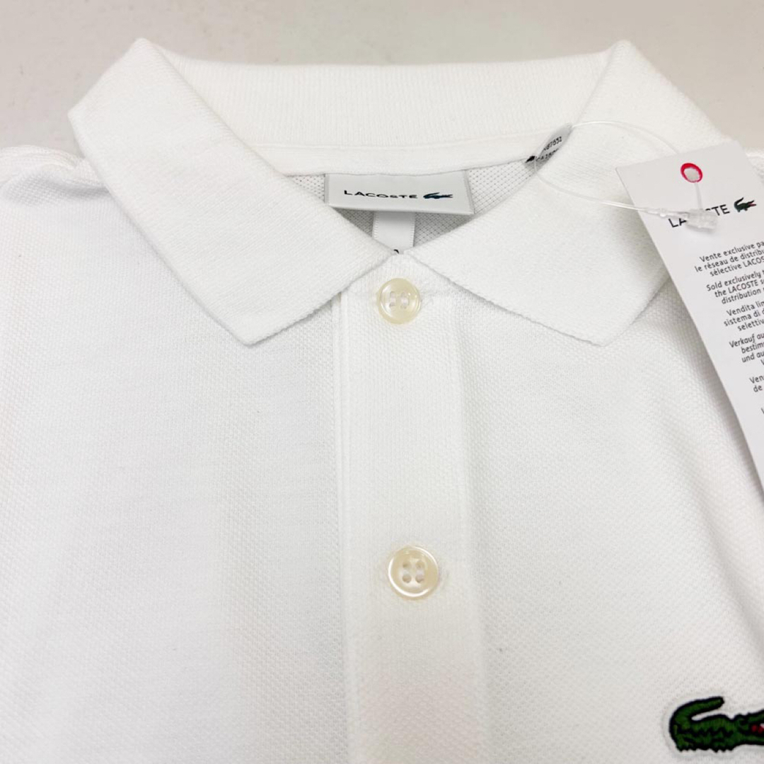 LACOSTE(ラコステ)の新品 わけあり LACOSTE 半袖ポロシャツ ホワイト ボーイズ12サイズ レディースのトップス(ポロシャツ)の商品写真