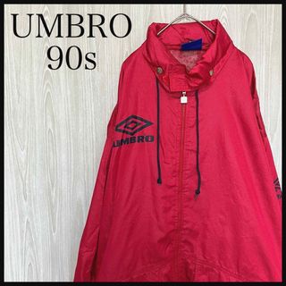 アンブロ(UMBRO)のZ899アンブロナイロンジャケットワンポイントロゴ大文字ロゴ90s袖プリント(ナイロンジャケット)