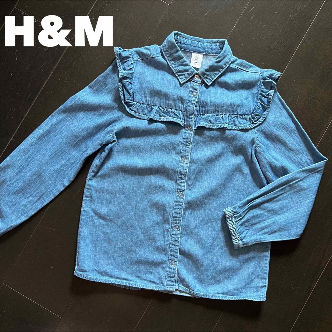 H&M(エイチアンドエム)のH&M【2回着用】140cm フリルデニムシャツ キッズ/ベビー/マタニティのキッズ服女の子用(90cm~)(ブラウス)の商品写真