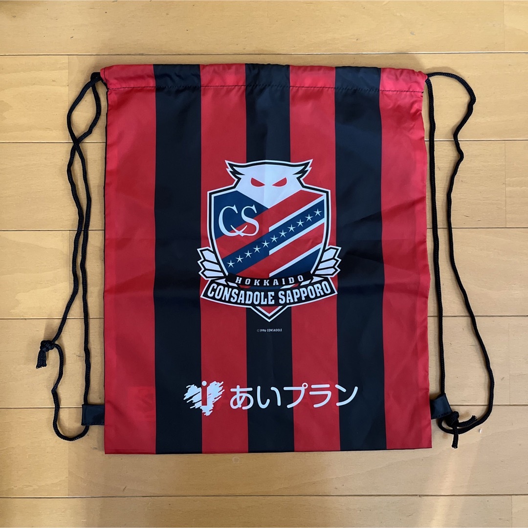 コンサドーレ 限定ナップザック 1~2枚 スポーツ/アウトドアのサッカー/フットサル(記念品/関連グッズ)の商品写真