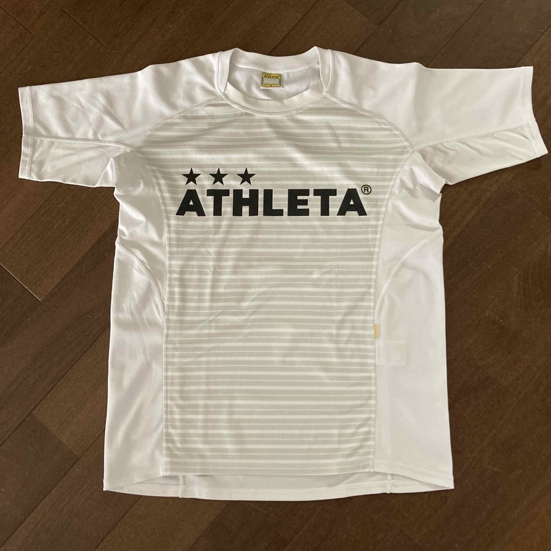 ATHLETA(アスレタ)のアスレタ トレーニングシャツ白M スポーツ/アウトドアのサッカー/フットサル(ウェア)の商品写真