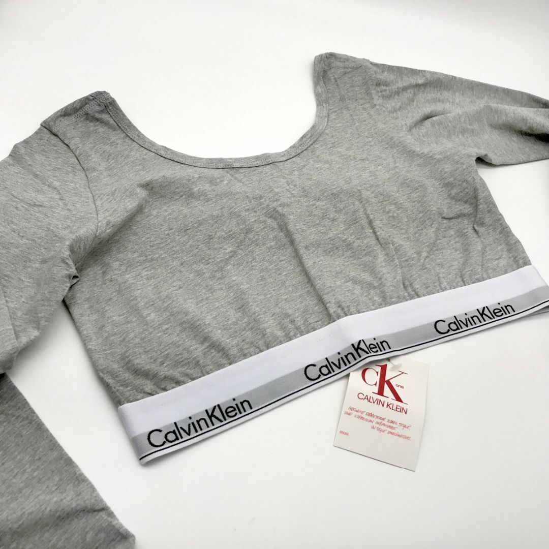 ck Calvin Klein(シーケーカルバンクライン)のカルバンクライン　レディース 　上着　長袖シャツ　Lサイズ　グレー レディースのトップス(Tシャツ(長袖/七分))の商品写真