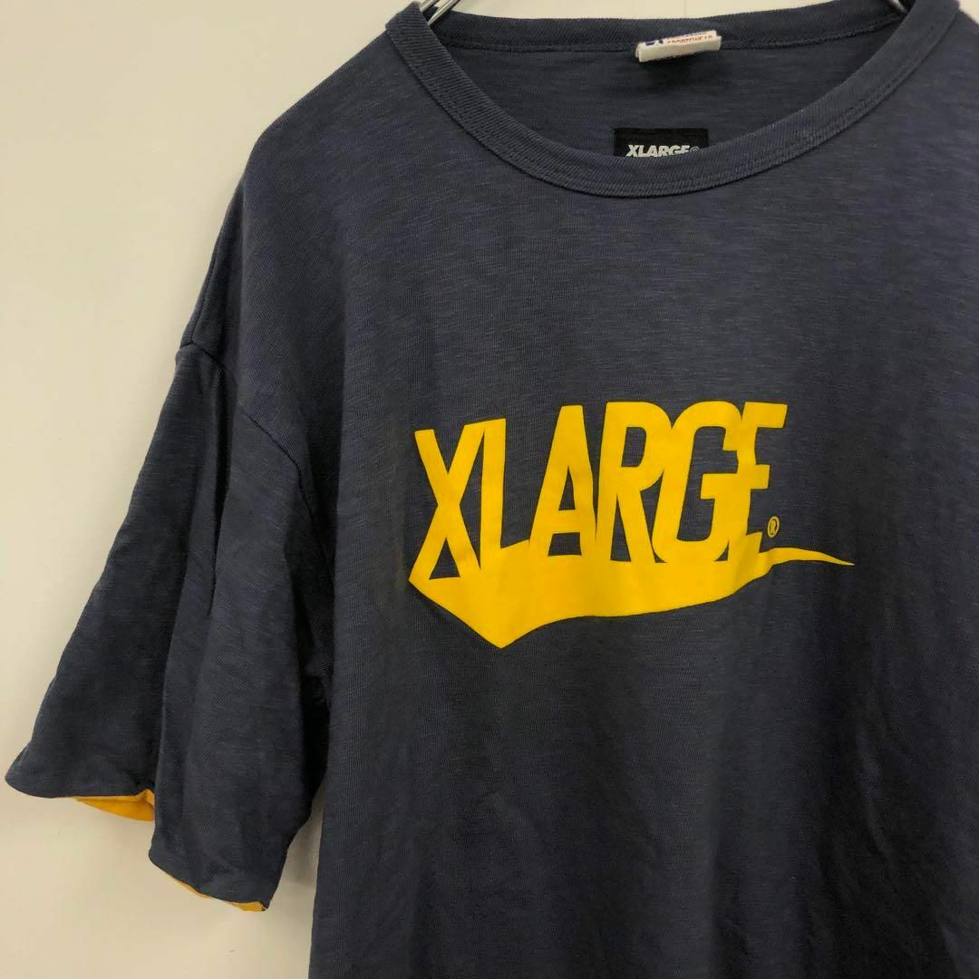 【送料無料】X-LARGE×Champion ランナーズタグ コラボTシャツ