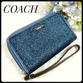 コーチ(COACH)のCOACH コーチ グリッター  リストレット ポーチ ストラップ  ネイビー(ポーチ)