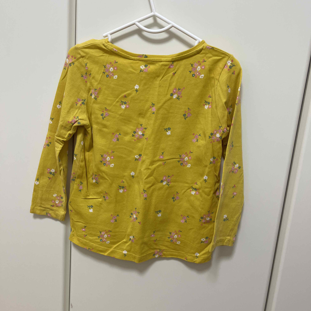 H&M(エイチアンドエム)の100 女の子 トップス イエロー 黄色 花柄 キッズ/ベビー/マタニティのキッズ服女の子用(90cm~)(Tシャツ/カットソー)の商品写真