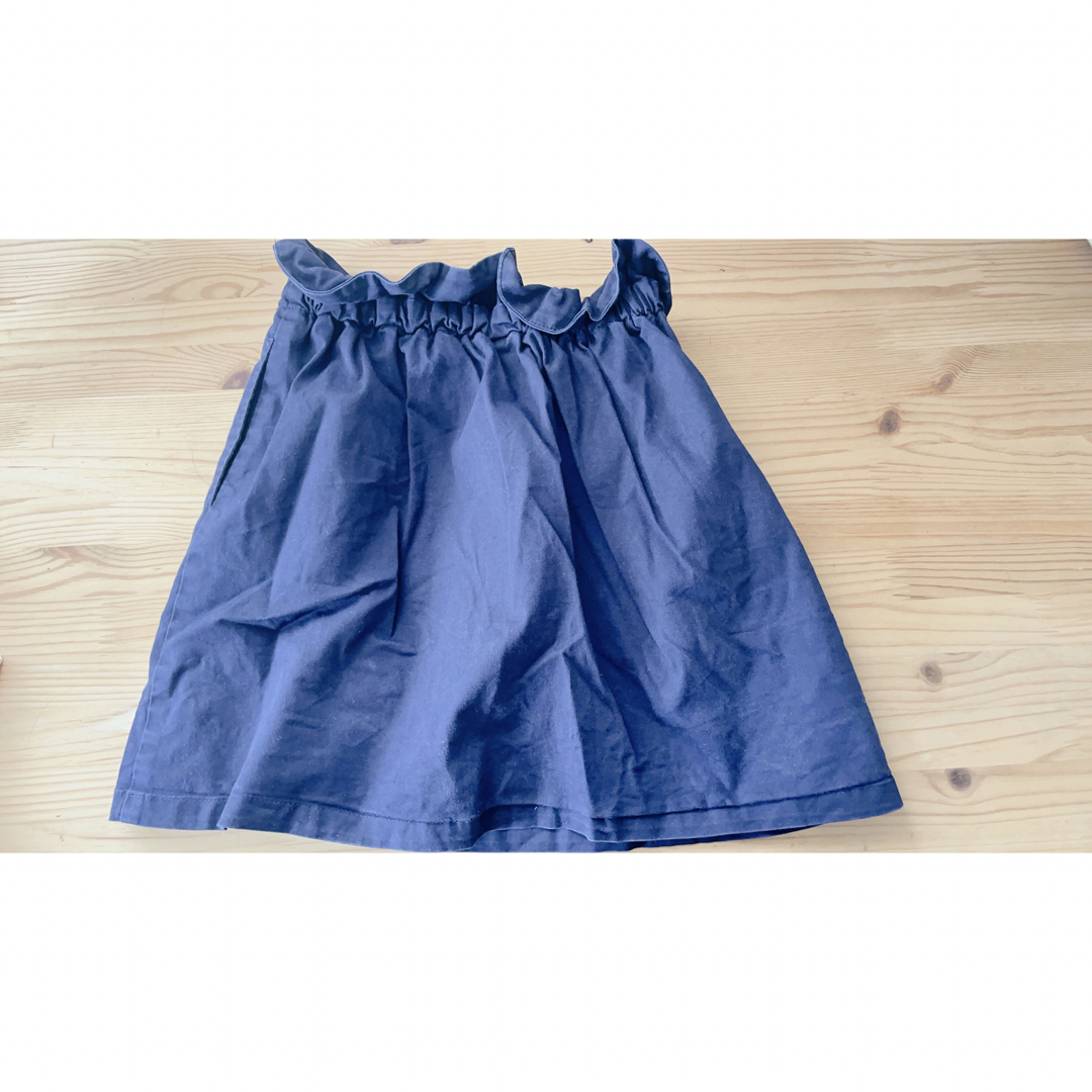 UNIQLO(ユニクロ)の120cmUNIQLOスカート紺色 115〜125 女の子 キッズ/ベビー/マタニティのキッズ服女の子用(90cm~)(スカート)の商品写真