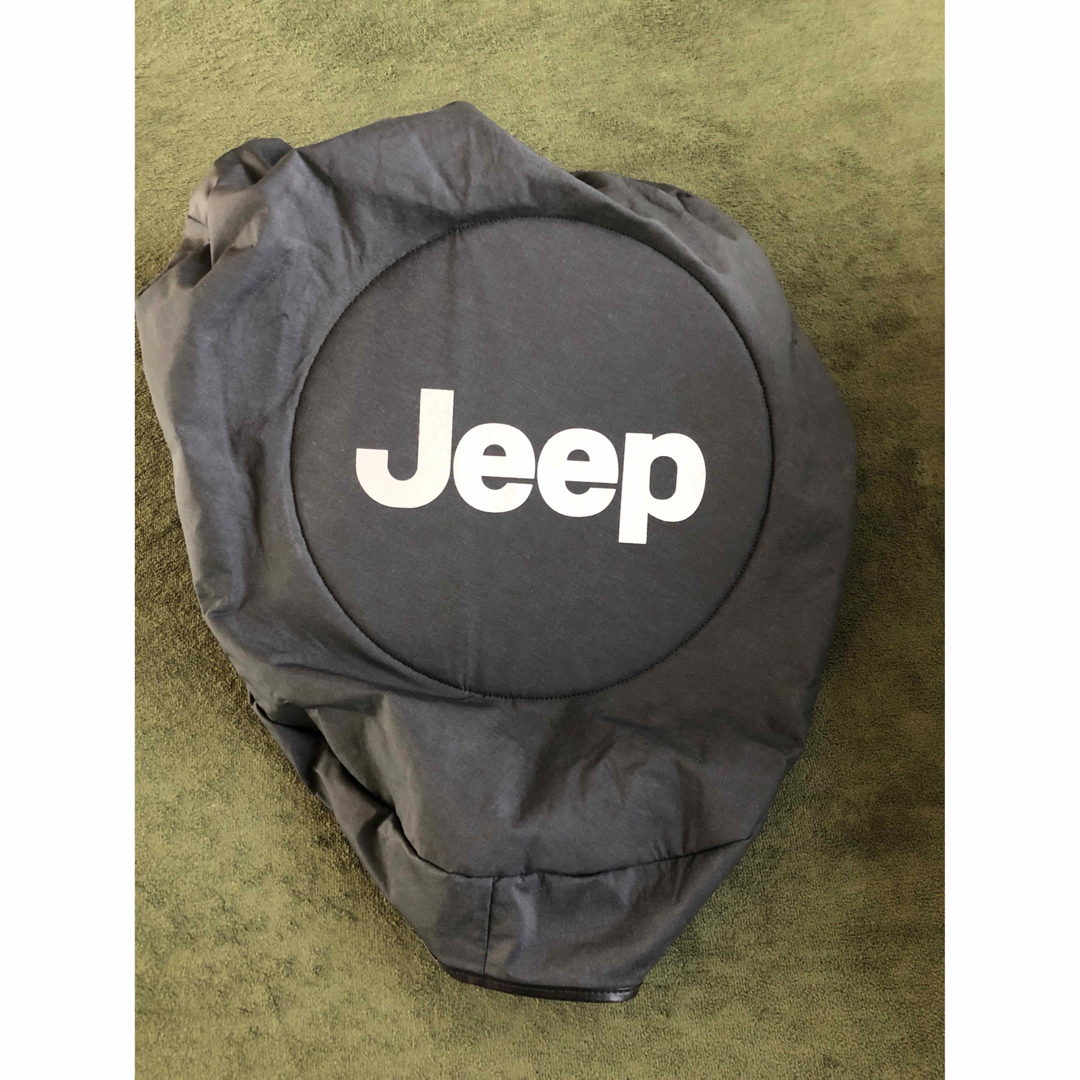 Jeep(ジープ)のジープ　スペアタイヤカバー　純正 自動車/バイクの自動車(車外アクセサリ)の商品写真
