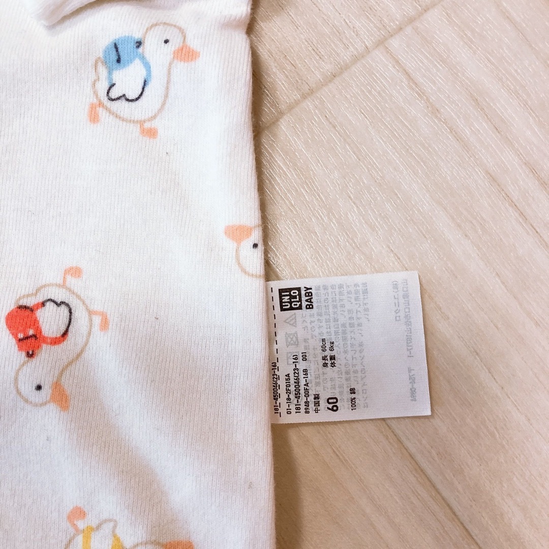 UNIQLO(ユニクロ)のUNIQLO 長袖カバーオール あひる柄 60 キッズ/ベビー/マタニティのベビー服(~85cm)(カバーオール)の商品写真