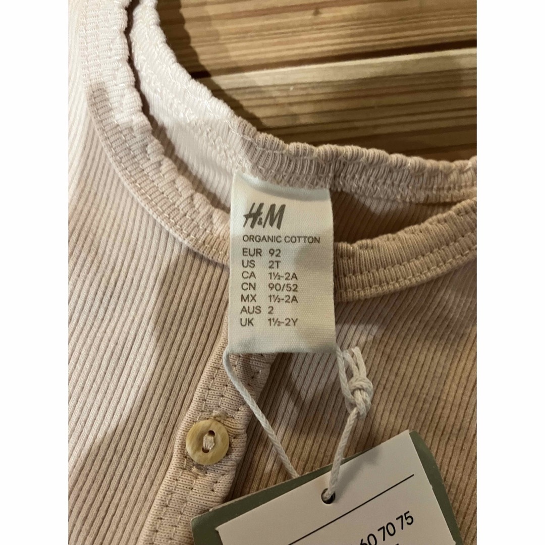 H&M(エイチアンドエム)のH&M ベビーロンパース　新品　タグ付き キッズ/ベビー/マタニティのキッズ服女の子用(90cm~)(下着)の商品写真