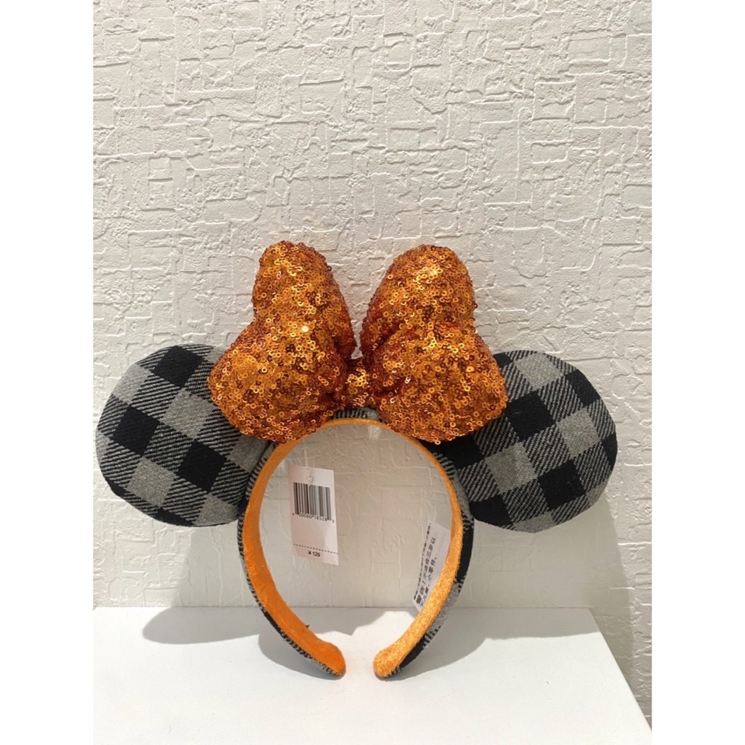 Disney(ディズニー)のディズニーカチューシャ　スパンコール　チェック　　オレンジ　海外  レディースのヘアアクセサリー(カチューシャ)の商品写真