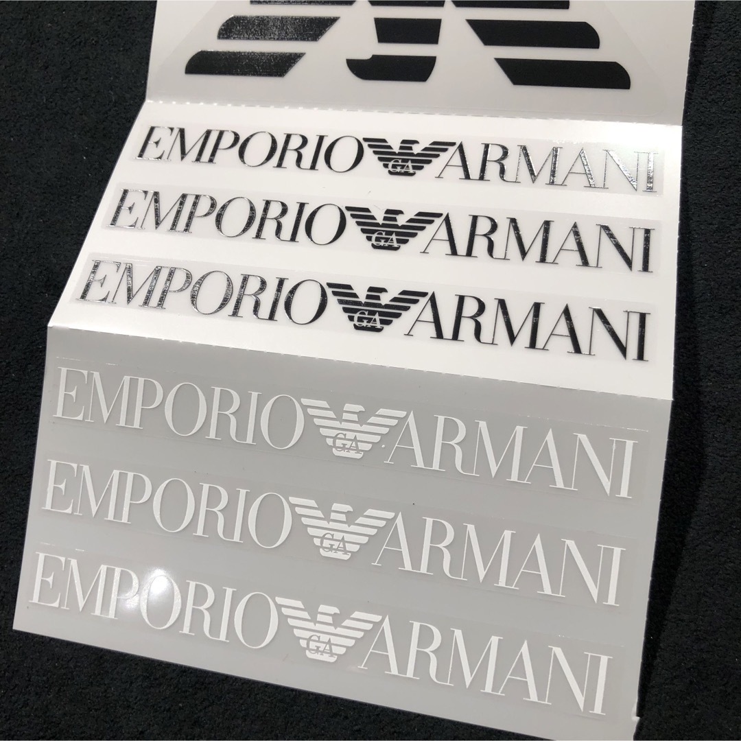 Emporio Armani(エンポリオアルマーニ)のアルマーニ  クリアステッカー 8種 12枚　セット　送料無料 メンズのメンズ その他(その他)の商品写真