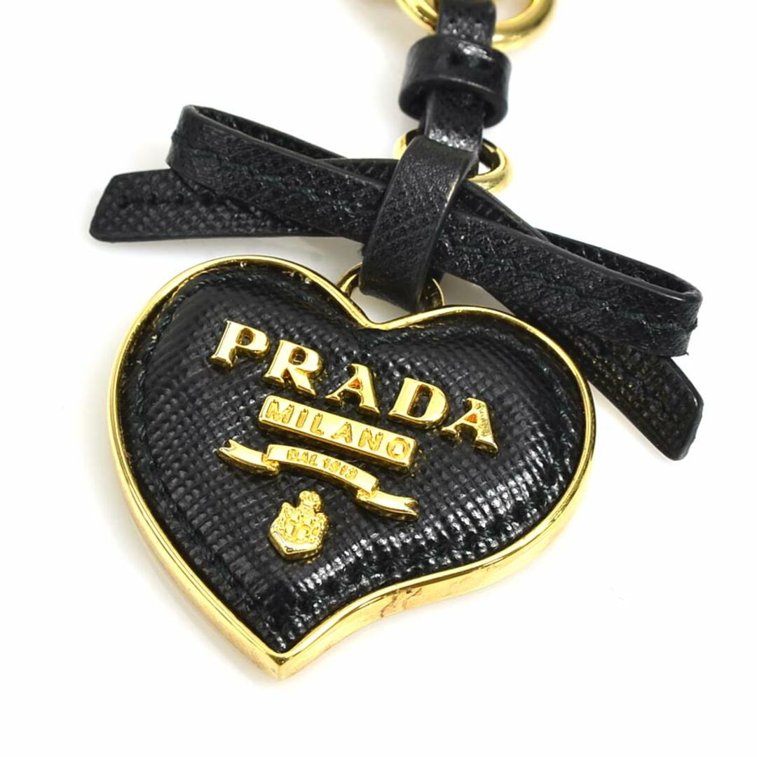 PRADA(プラダ)のプラダ PRADA キーリング チャーム ハート リボン メタル/レザー ゴールド/ブラック レディース 送料無料【中古】 e56949a レディースのファッション小物(キーケース)の商品写真