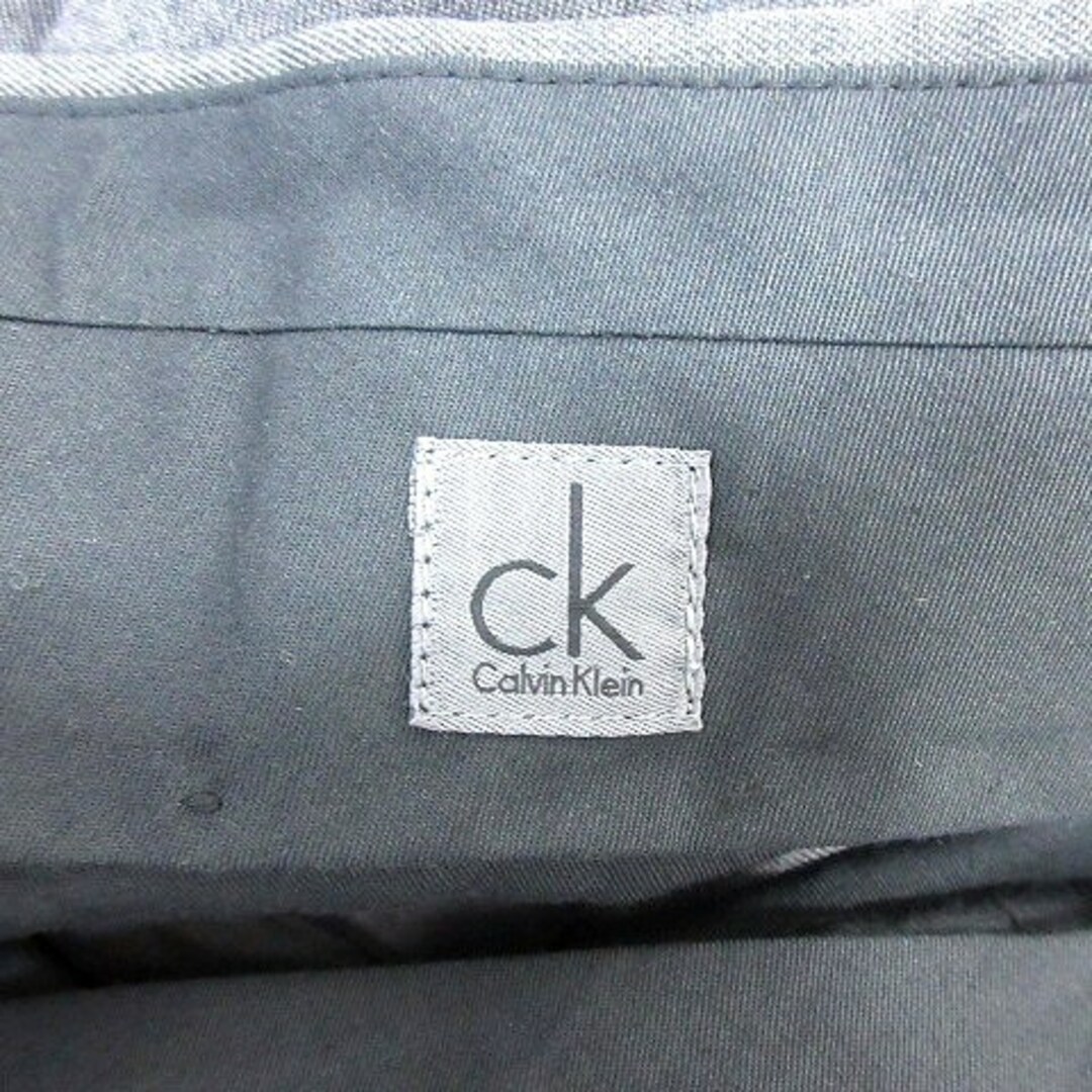 ck Calvin Klein(シーケーカルバンクライン)のシーケーカルバンクライン パンツ スラックス テーパード センタープレス グレー メンズのパンツ(スラックス)の商品写真