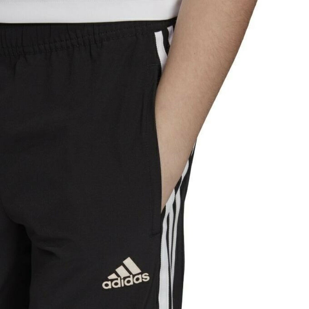 adidas(アディダス)の新品 黒 140 アディダス ジュニア クロップドパンツ 7分丈パンツ キッズ/ベビー/マタニティのキッズ服男の子用(90cm~)(パンツ/スパッツ)の商品写真