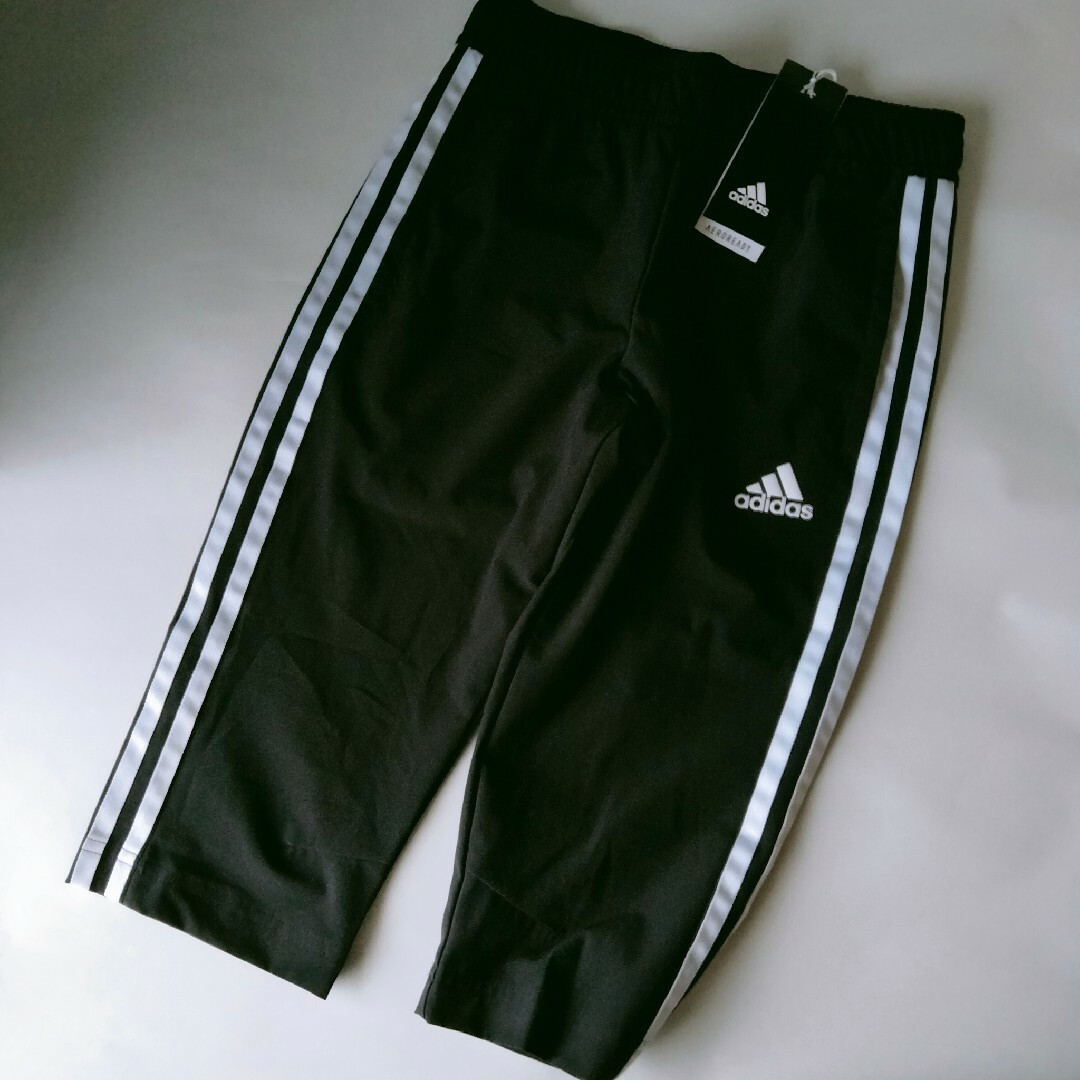 adidas(アディダス)の新品 黒 140 アディダス ジュニア クロップドパンツ 7分丈パンツ キッズ/ベビー/マタニティのキッズ服男の子用(90cm~)(パンツ/スパッツ)の商品写真