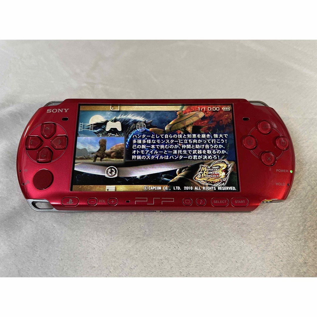 PlayStation Portable(プレイステーションポータブル)の☆新品同様☆ PSP-3000  ラディアントレッド エンタメ/ホビーのゲームソフト/ゲーム機本体(携帯用ゲーム機本体)の商品写真