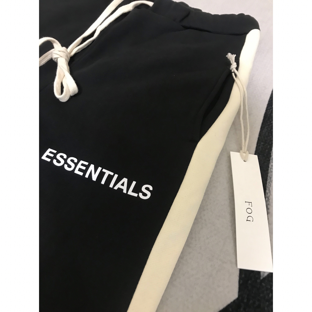 FEAR OF GOD(フィアオブゴッド)の新品ESSENTIALS エッセンシャルズ サイドストライプパンツ ブラック S メンズのパンツ(その他)の商品写真