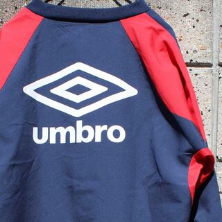 アンブロ(UMBRO)のumbro アンプロ ロゴ刺繍 紺 × 赤 古着 プルジャケット(ジャージ)
