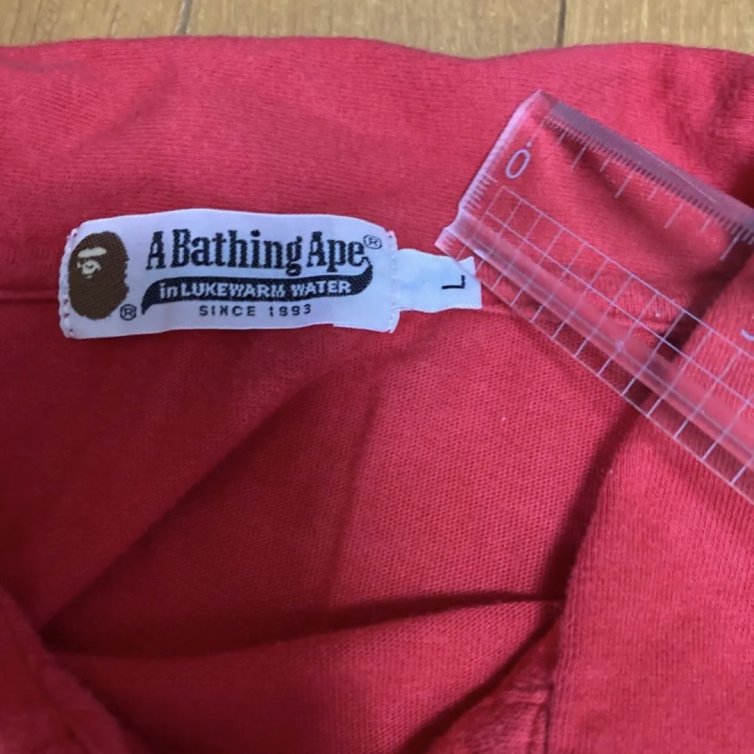 A BATHING APE(アベイシングエイプ)のメンズ 半袖ポロシャツ Lサイズ 赤 夏服 アベイシングエイプ メンズのトップス(ポロシャツ)の商品写真