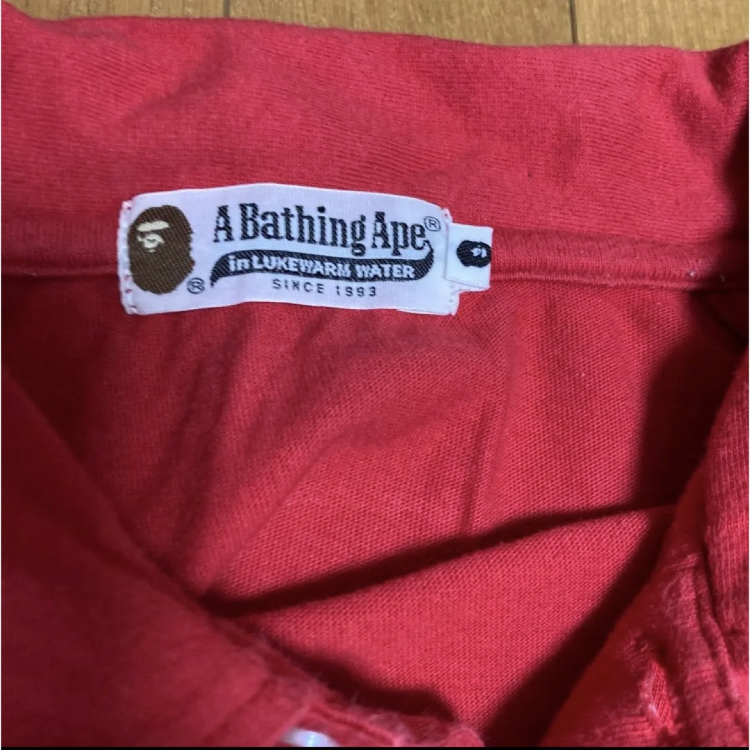 A BATHING APE(アベイシングエイプ)のメンズ 半袖ポロシャツ Lサイズ 赤 夏服 アベイシングエイプ メンズのトップス(ポロシャツ)の商品写真