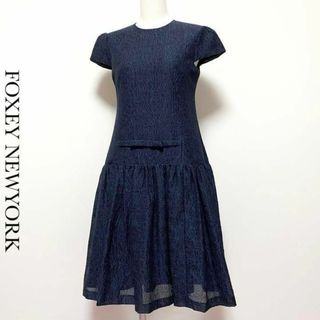 フォクシーニューヨーク(FOXEY NEW YORK)の【定価7.2万】FOXEY NEWYORK リボンフレアワンピース 紺 ネイビー(ひざ丈ワンピース)