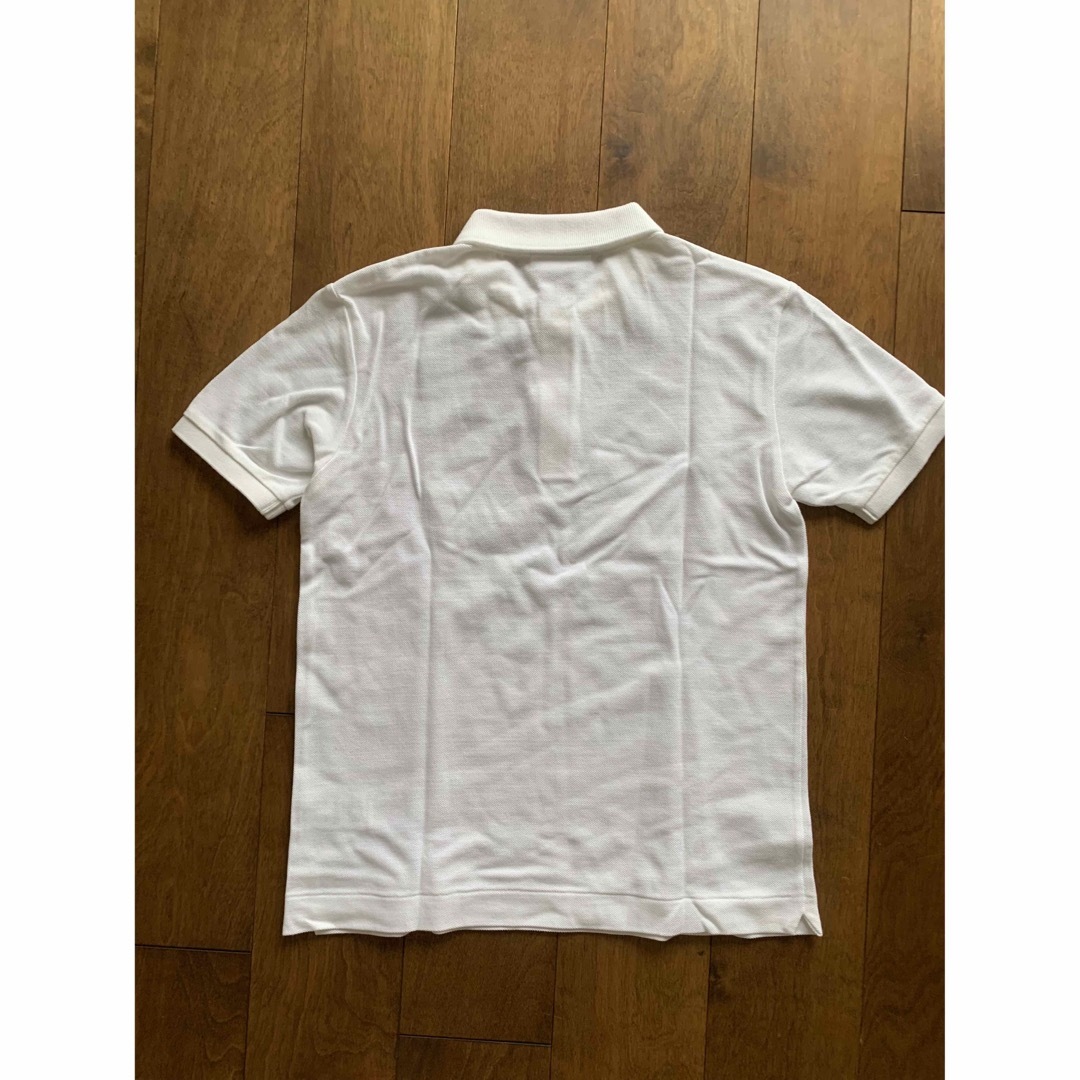 LACOSTE(ラコステ)の未使用　ラコステ　レディース　白 ポロシャツ レディースのトップス(ポロシャツ)の商品写真