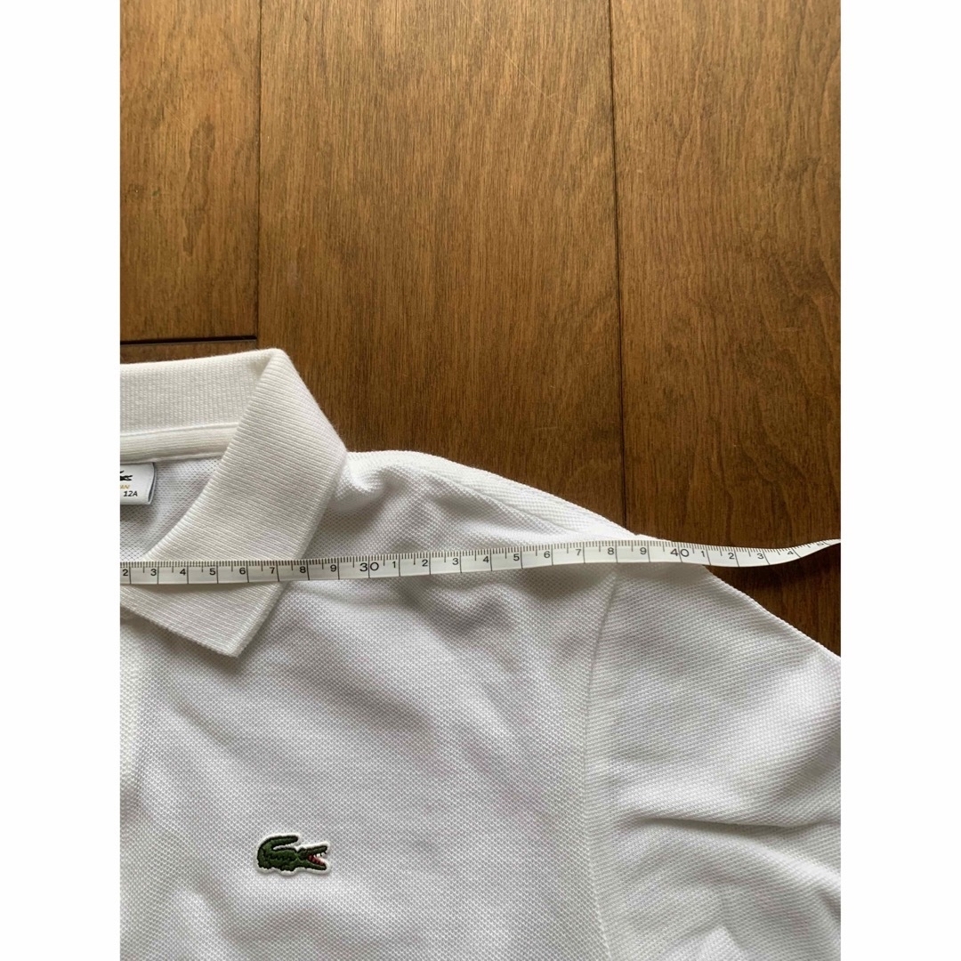 LACOSTE(ラコステ)の未使用　ラコステ　レディース　白 ポロシャツ レディースのトップス(ポロシャツ)の商品写真