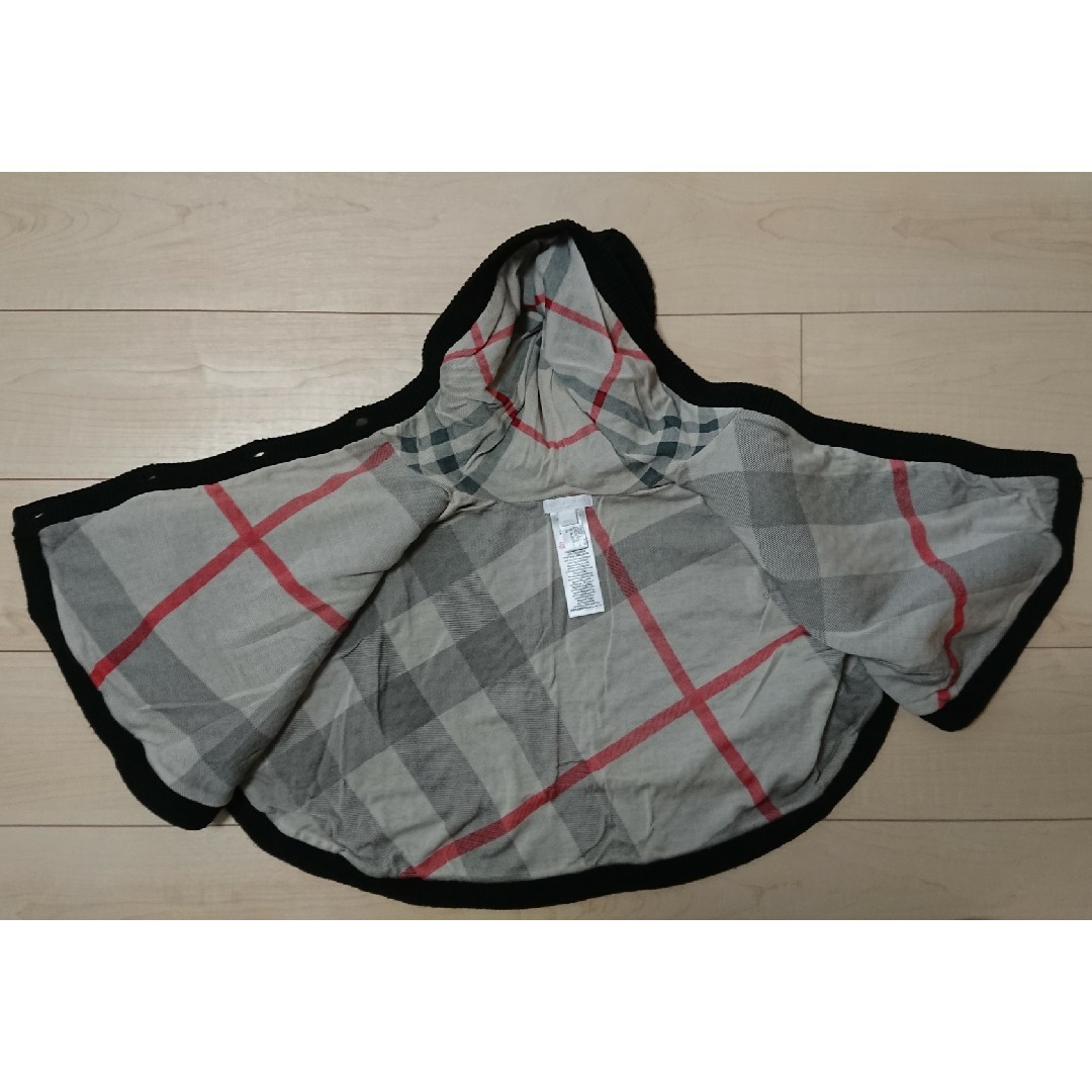 BURBERRY(バーバリー)のBURBERRY ニットポンチョ 黒 80～ キッズ/ベビー/マタニティのベビー服(~85cm)(ジャケット/コート)の商品写真